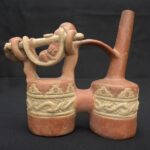 Moche ceramic double-bottle bottle with monkey and human figures
