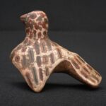 Nazca ceramic bird whistle with painted feather motifs