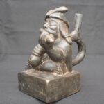 🎶 Moche Musician Figurine – Ceramic Sculpture of a Seated Flute Player