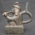 🎶 Moche Musician Figurine – Ceramic Sculpture of a Seated Flute Player - Imagen 2