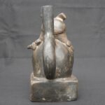 🎶 Moche Musician Figurine – Ceramic Sculpture of a Seated Flute Player - Imagen 3