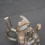 🎶 Moche Musician Figurine – Ceramic Sculpture of a Seated Flute Player - Imagen 6