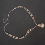 Collar Moche en plata con dije ritual en forma de concha