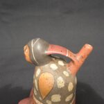 Nasca Ceramic Bottle – Seated Female Figure with Dagger and Painted Motifs - Imagen 6