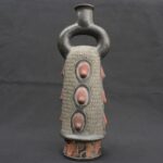 ⚫ Pre-Columbian Ceramic Bottle with Ritual Reliefs and Stirrup Handle