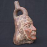 🏺 Moche Ceramic Portrait Bottle with Headdress and Stirrup