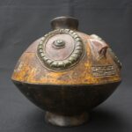 Pre-Columbian Nasca Ceramic Bottle with Anthropomorphic Design