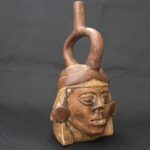 Pre-Columbian Moche Ritual Ceramic Bottle with Face