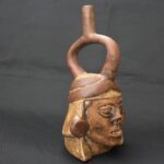 Pre-Columbian Moche Ritual Ceramic Bottle with Face - Imagen 9
