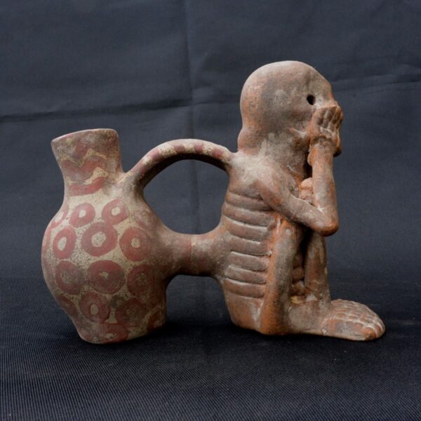 Moche Pre-Columbian Ceramic Whistle with Skeleton Design - Image 4