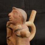 Pre-Columbian Moche Ceramic Bottle with Human Figure - Image 10